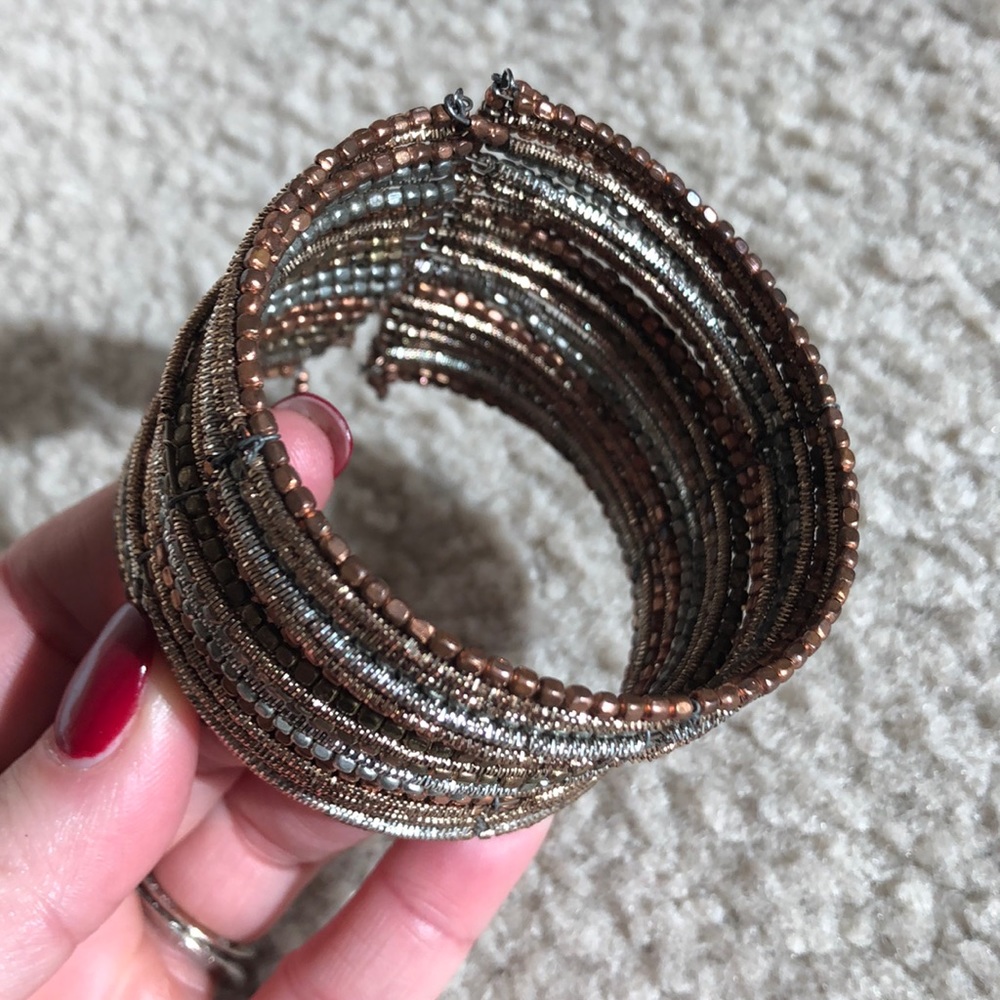 Super cute wrist cuff bracelet. Metallic copper